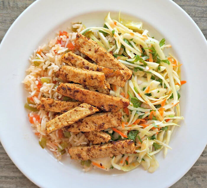 Spiced Vegan Chicken Strips with Sofrito Rice and Lime Coleslaw